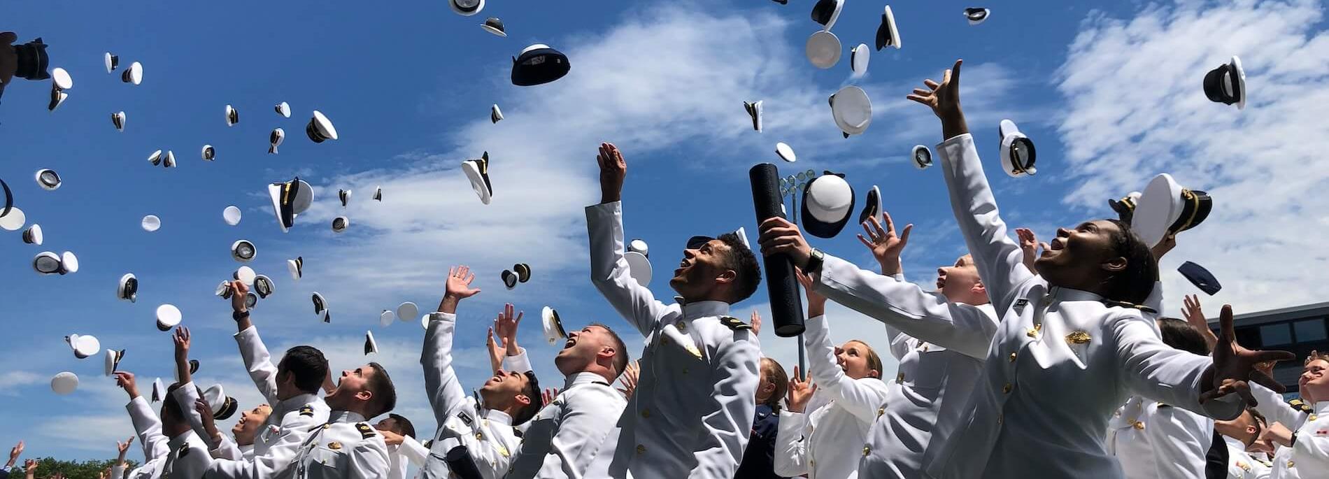 Cadets tossing hats