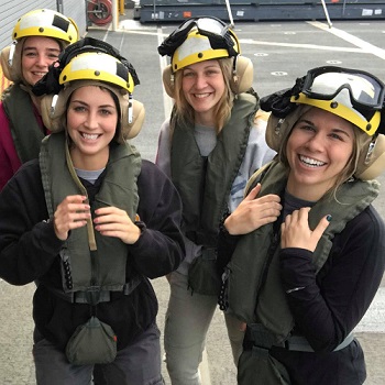 Female students testing flight gear.