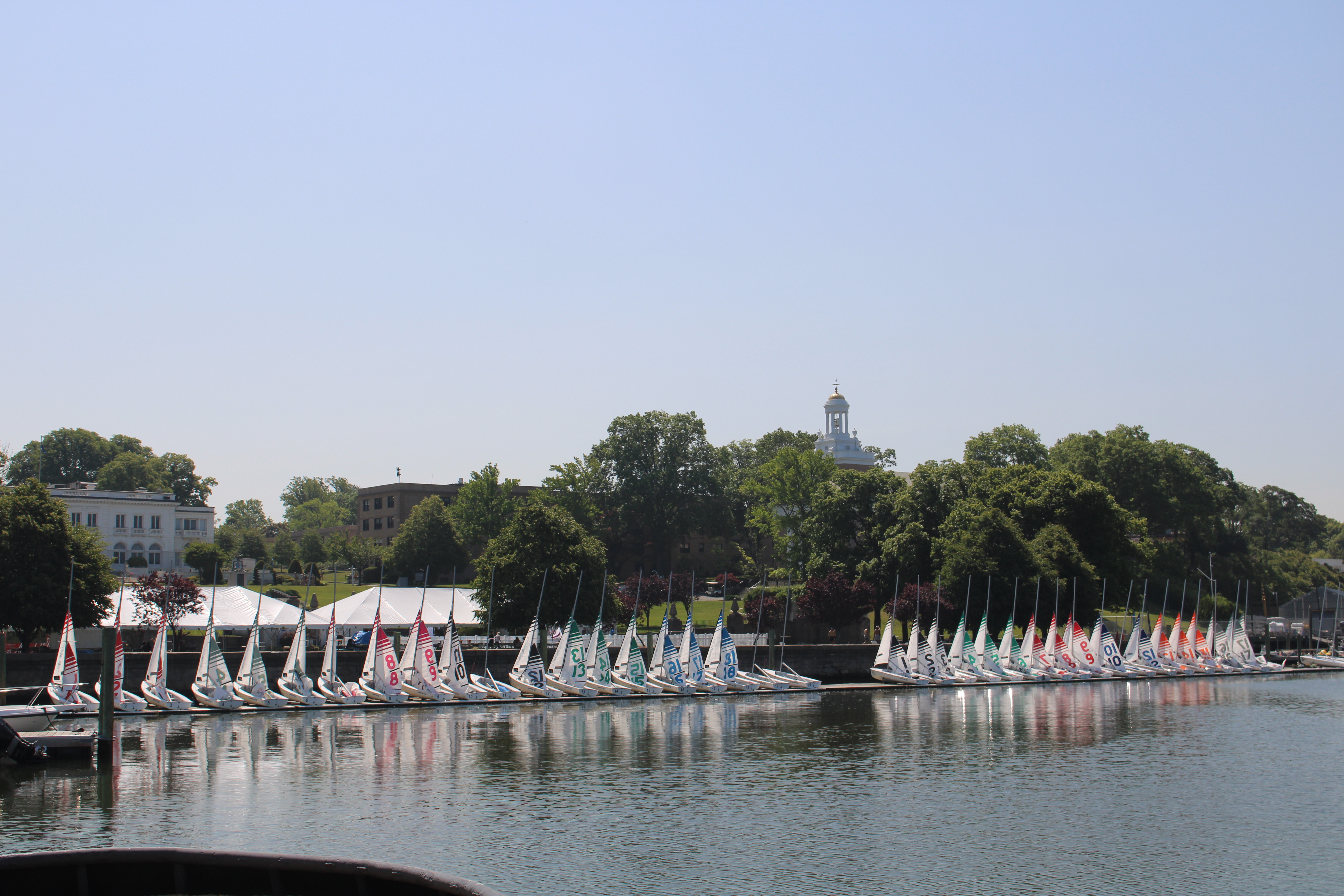 Boats lined up with Wiley Hall in the background