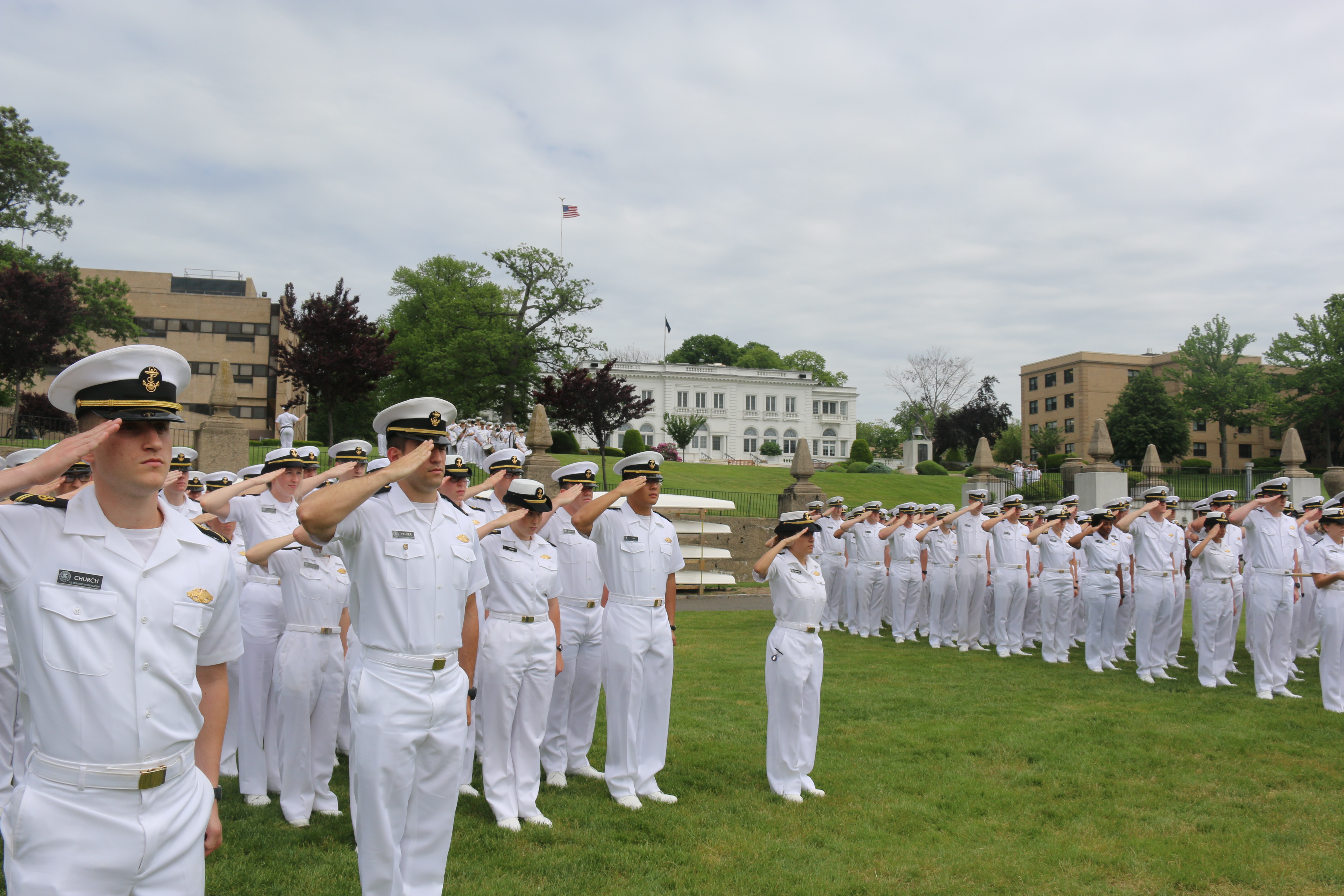 The Regiment of Midshipmen salute the colors at the USS Zephyr Welcome Ceremony
