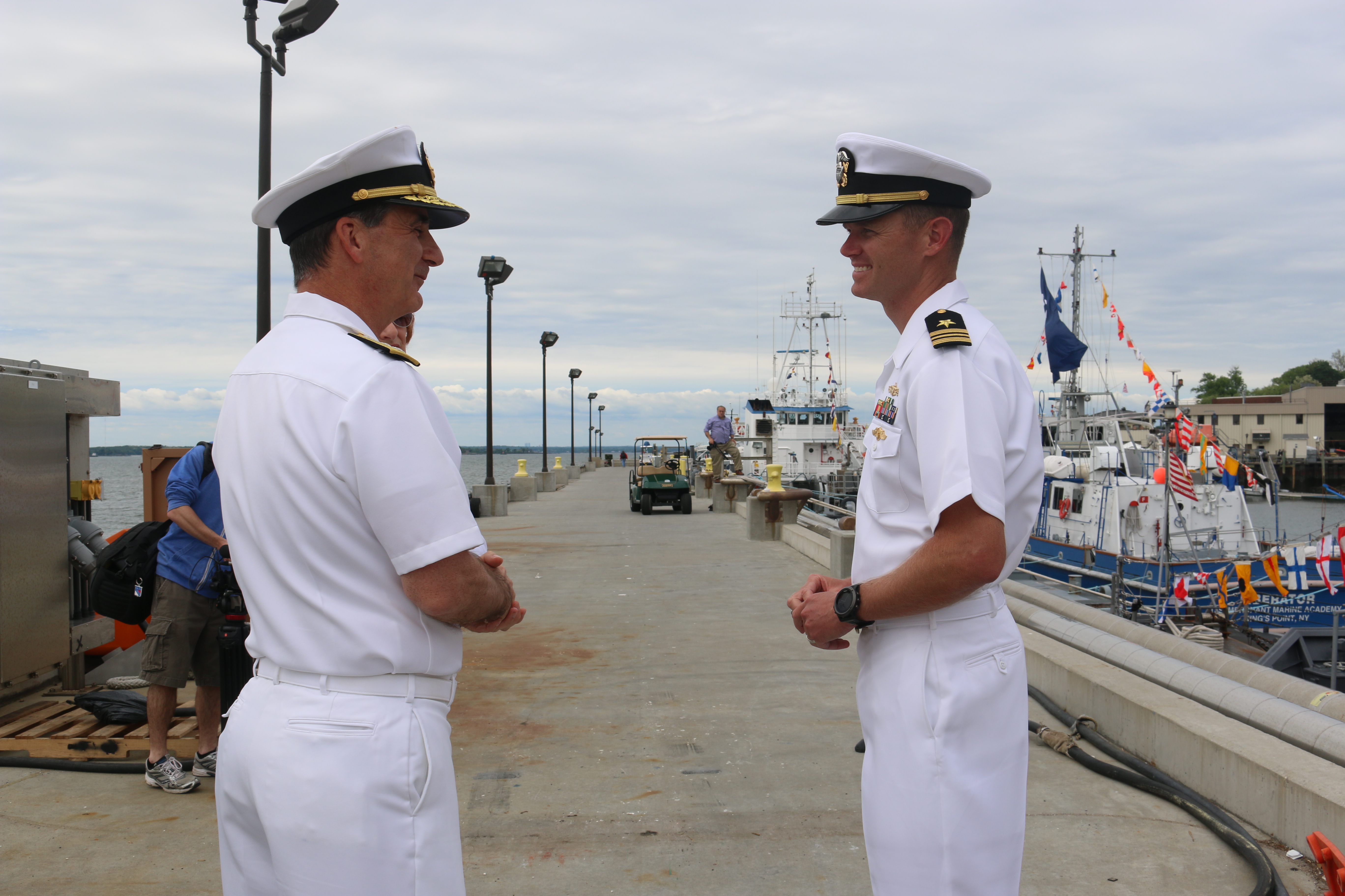 RADM Helis welcomes LCDR Ingram and USS Zephyr