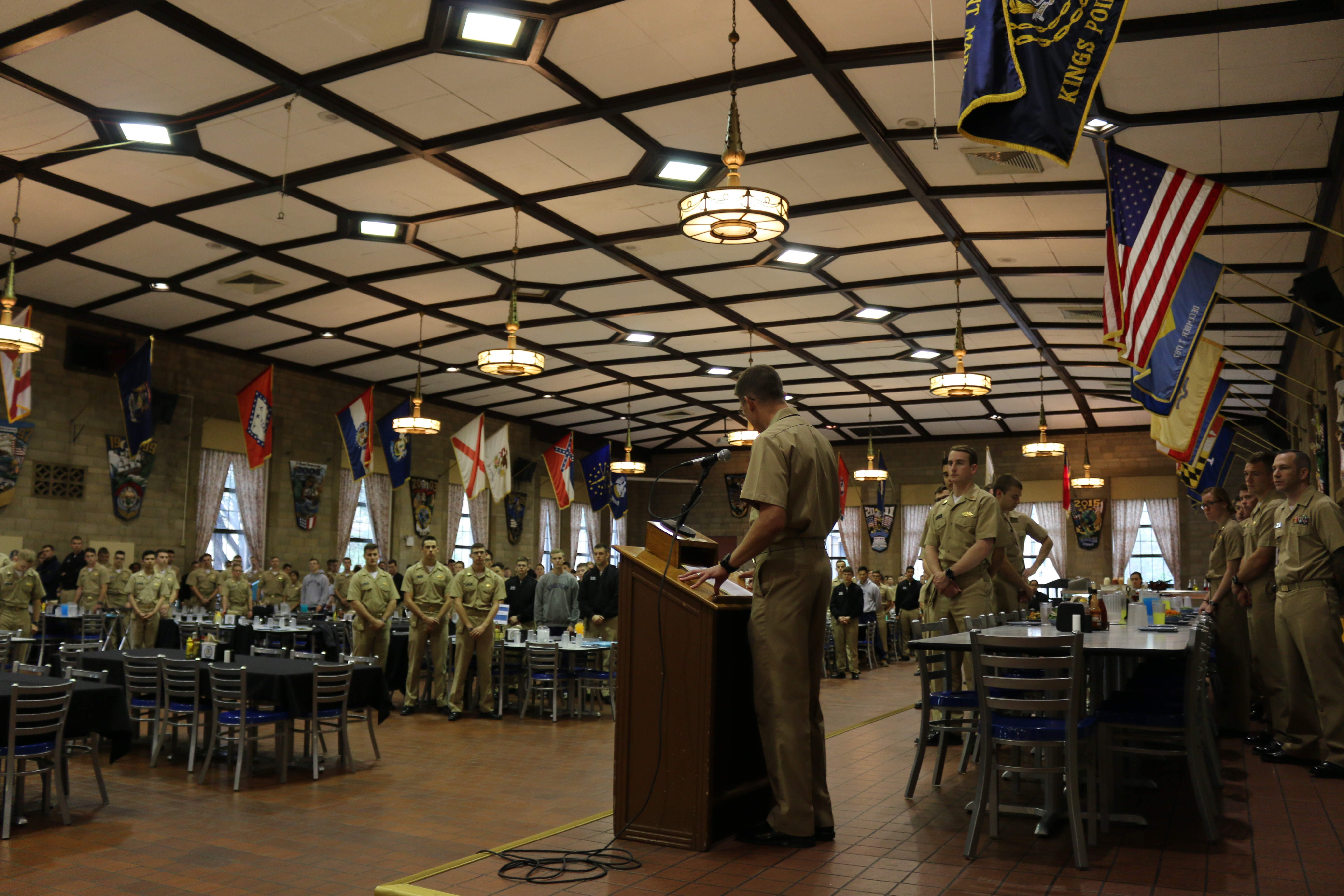 LCDR Ingram receives a warm welcome from the Regiment of Midshipmen