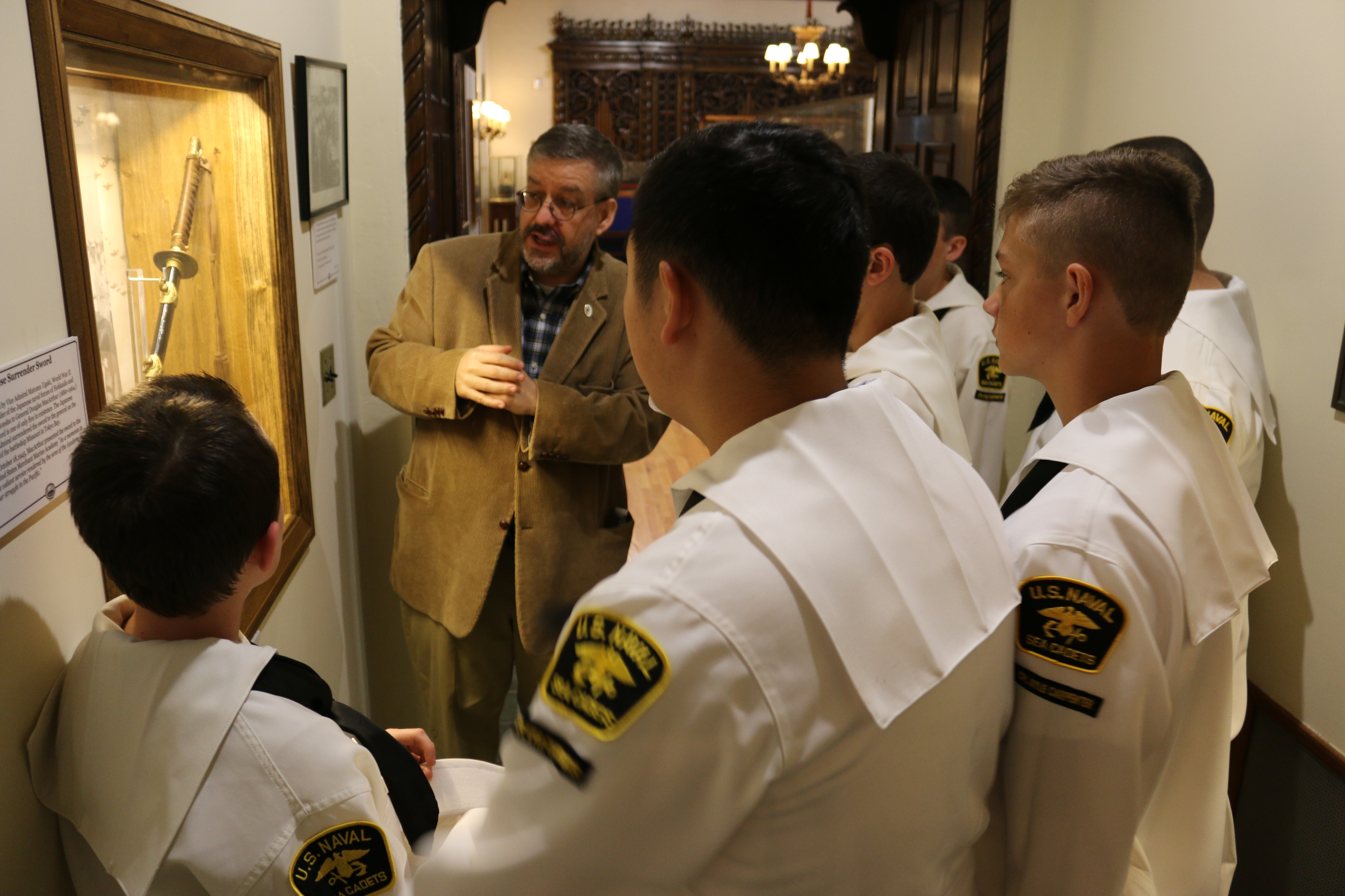 Dr. Josh Smith shows US Naval Sea Cadets (CPL Kyle Carpenter Division) the WWII Japanese surrender sword 