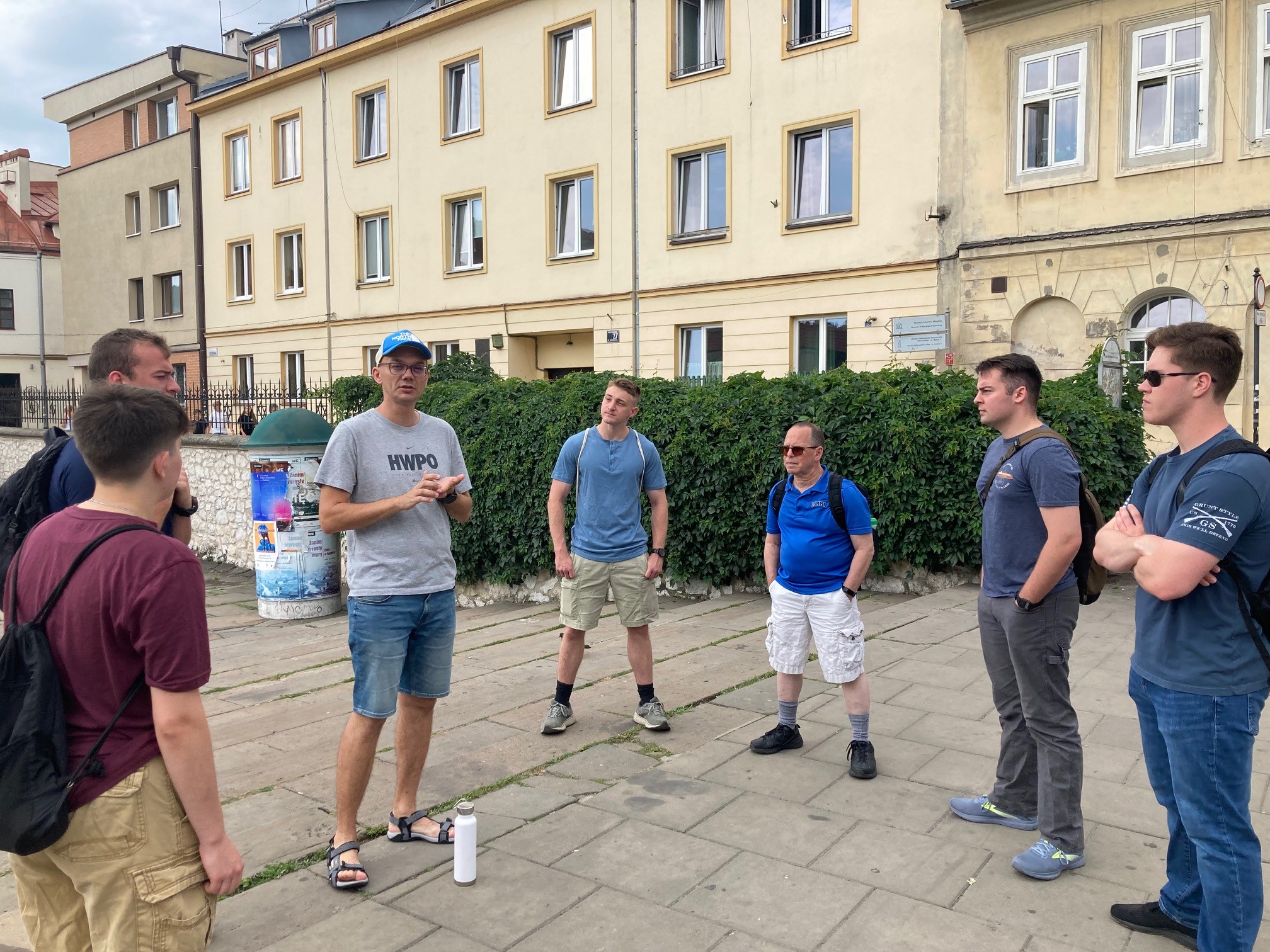 Students and Dr Melcer with local instructor, Maciek, outside the synagogue in Krakow