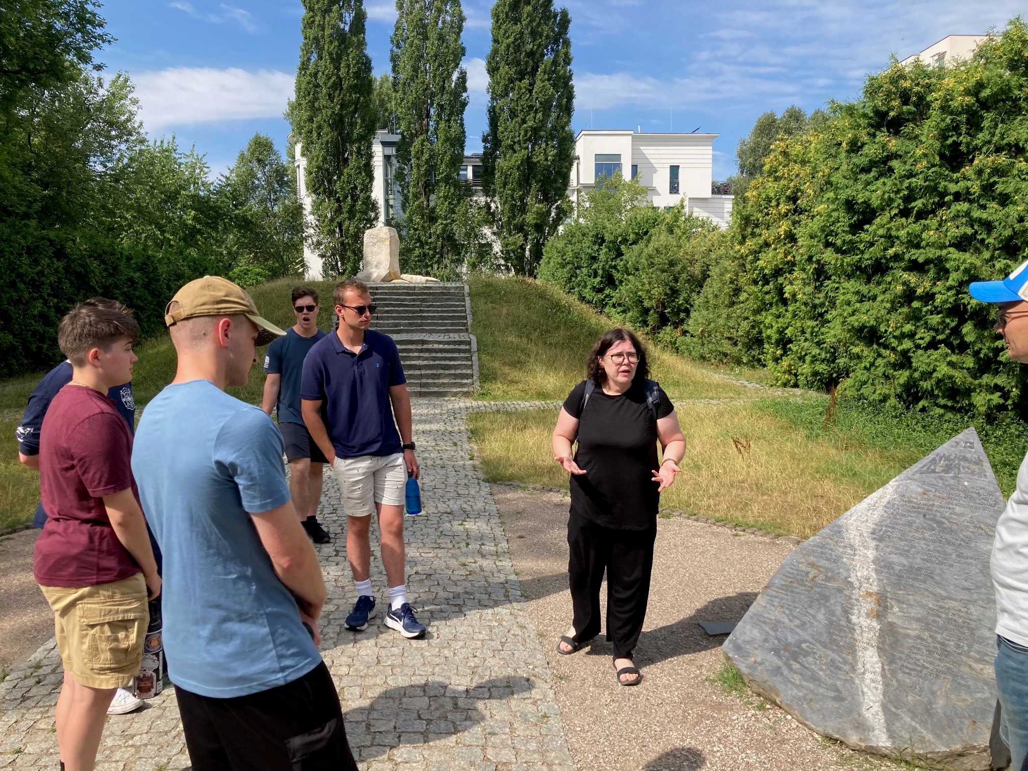 Students listen as our instructors discuss this site, where Polish resistance fighters were killed in the bunker from which they fought German occupiers