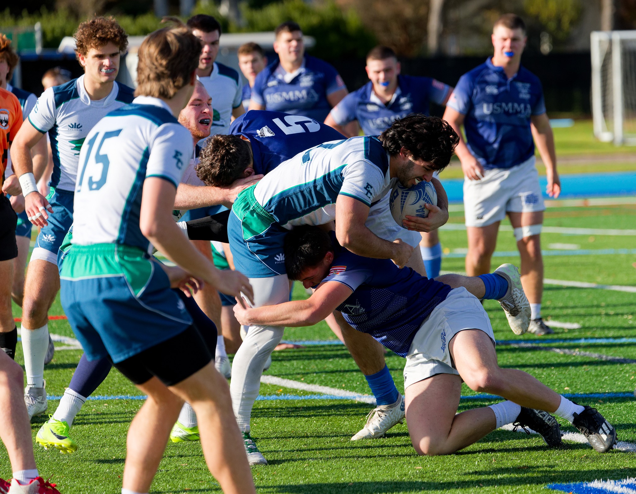 USMMA Rugby player tackling appointment.