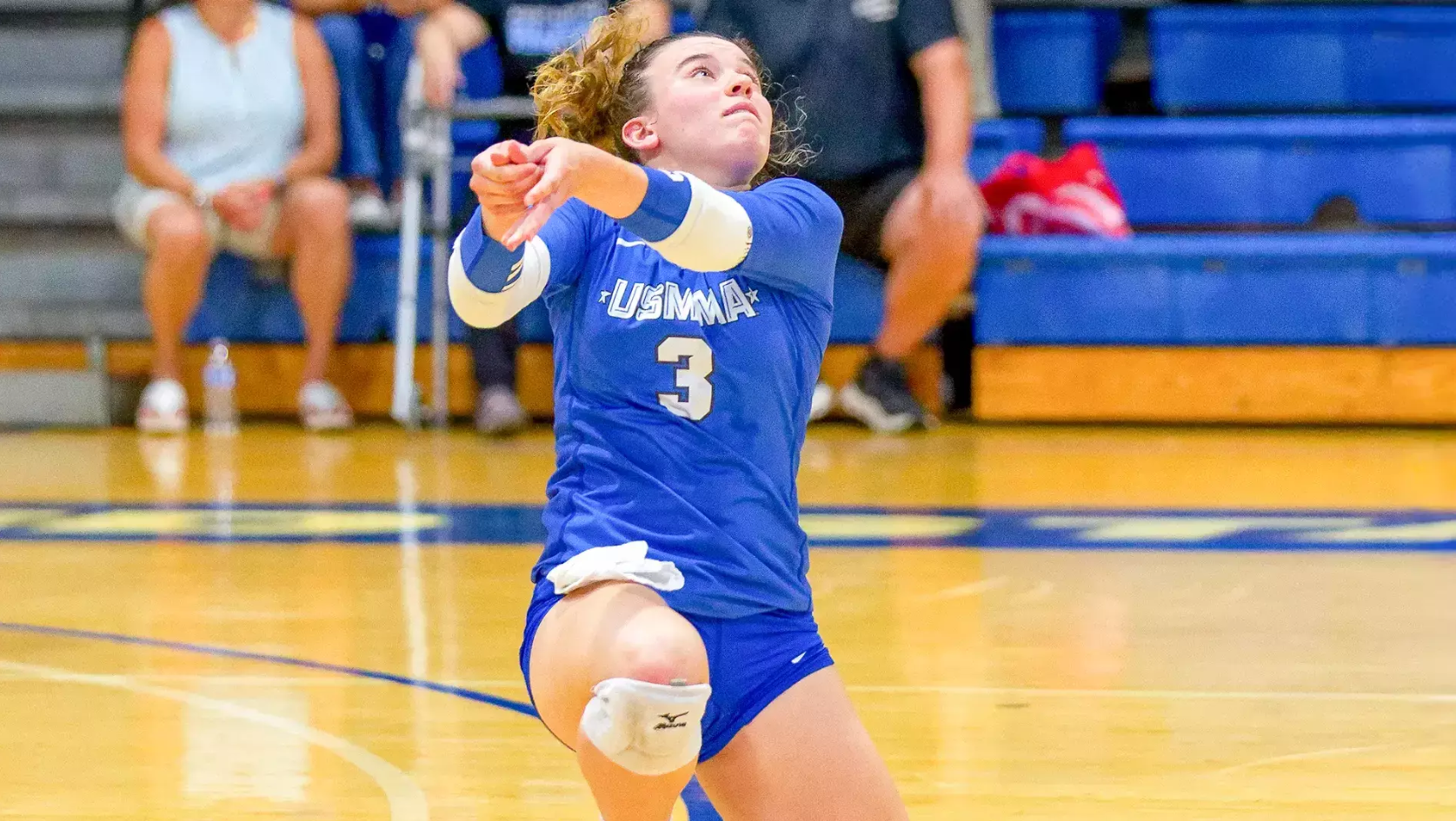 Women's volleyball player.