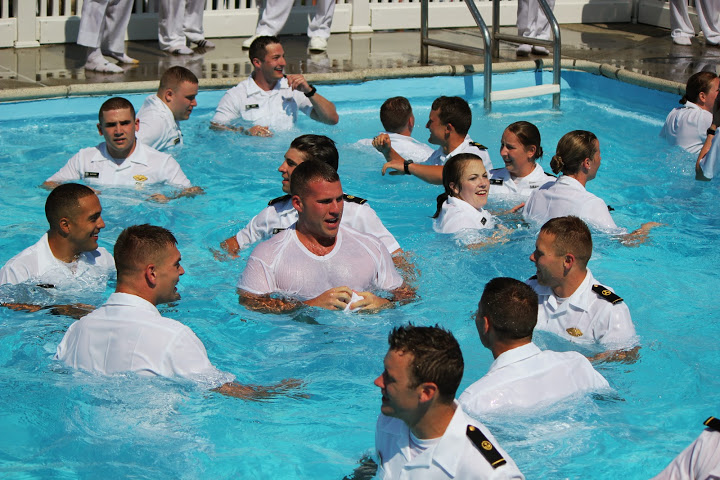 Uniformed Midshipmen relaxing in Eldridge Pool