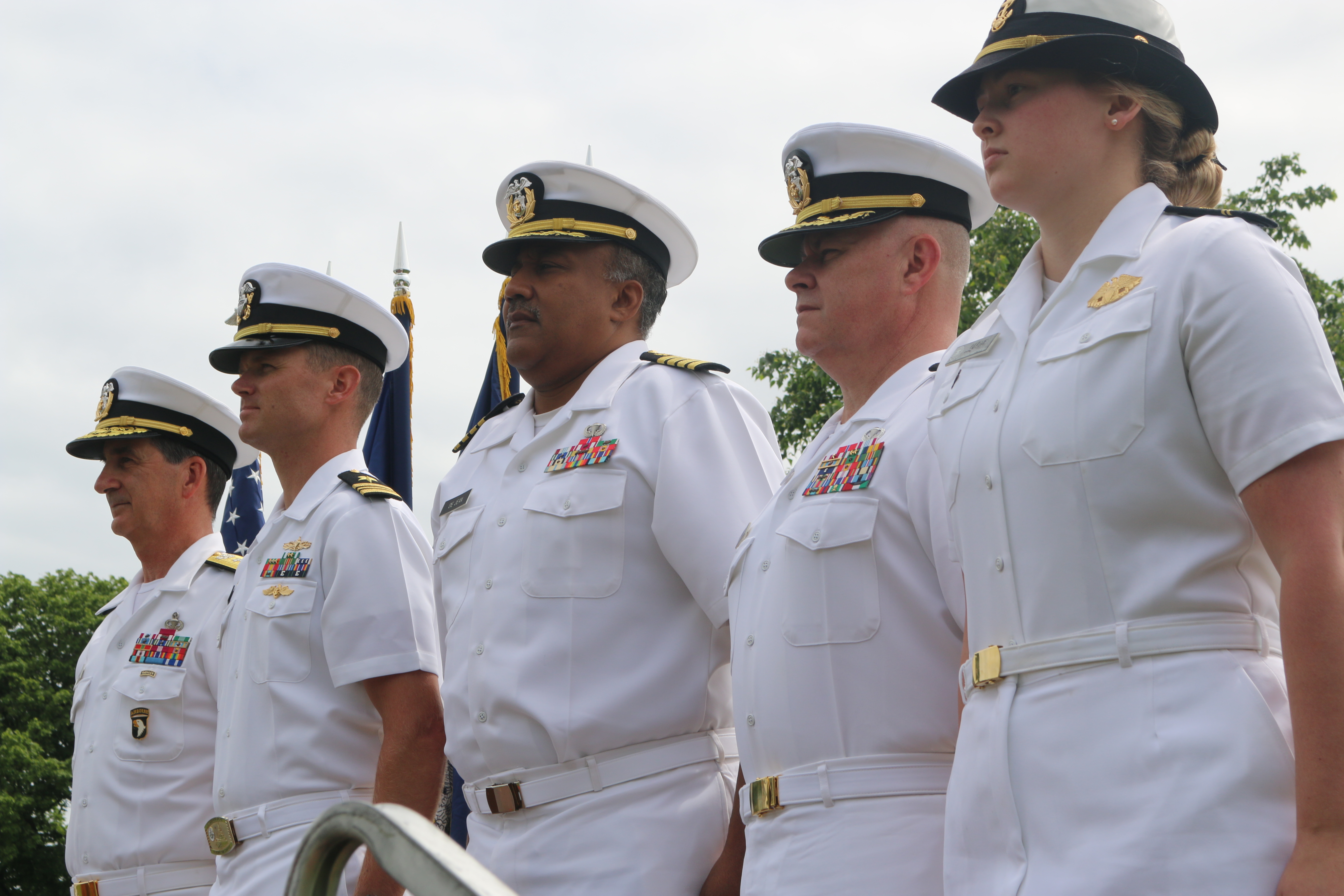 RADM Helis, LCDR Ingram, Academic Dean DeJean, Commandant Stroud, Midshipman Grove 