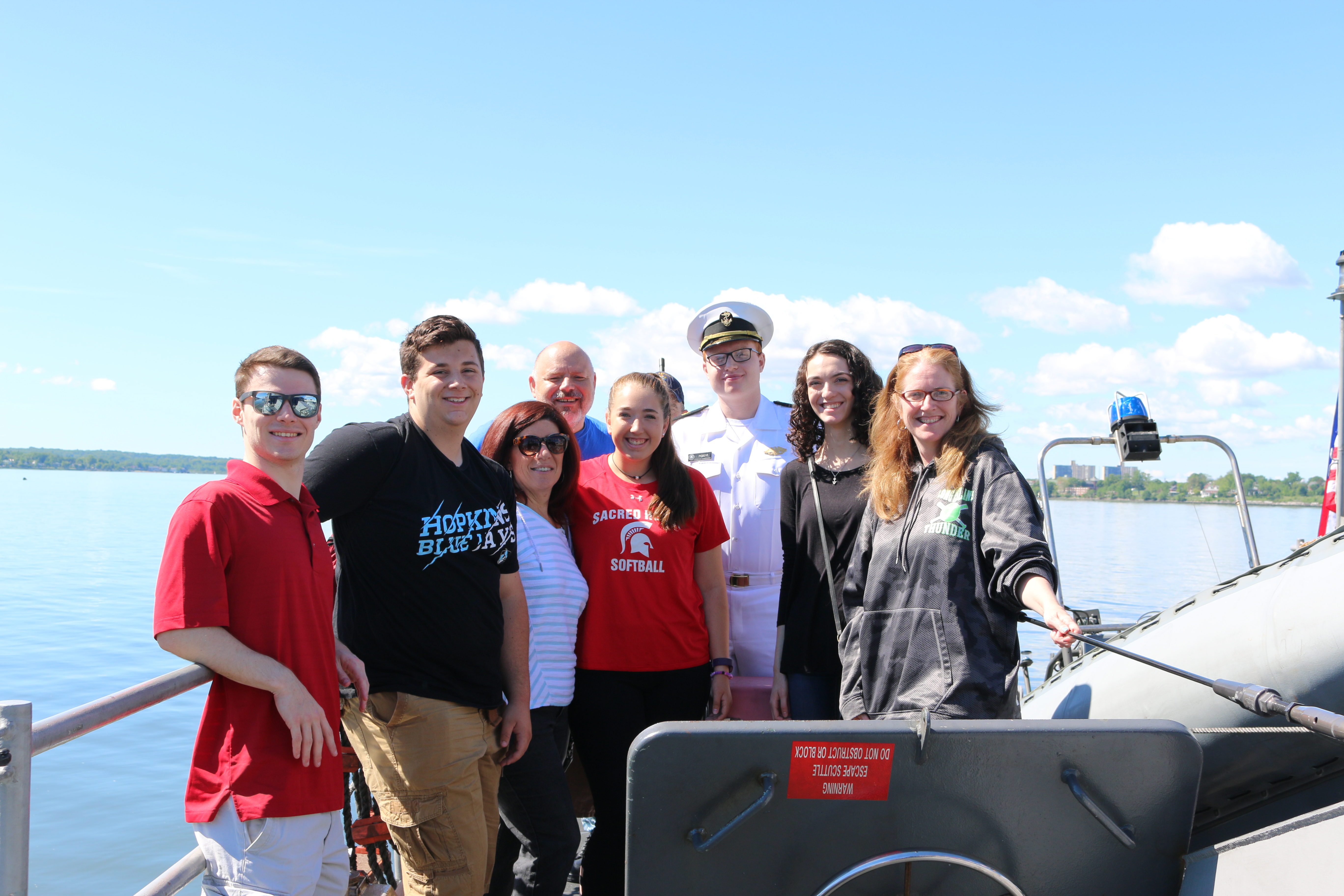 Midshipman Liam Perini joins family and friends aboard the USS Zephyr