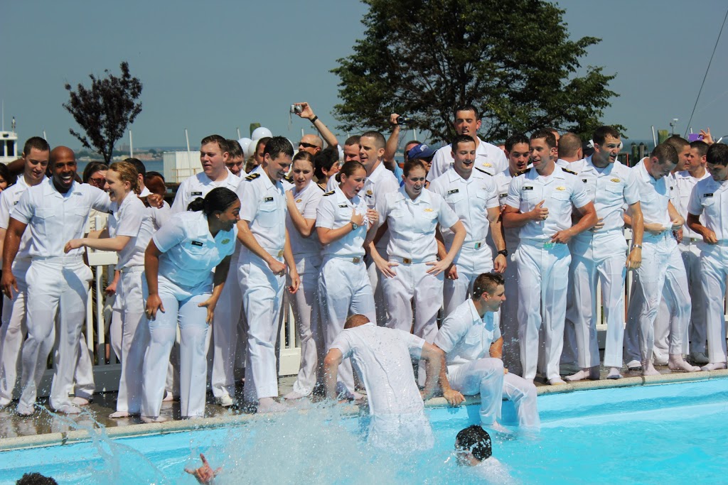 Midshipmen cheer on classmates in the pool