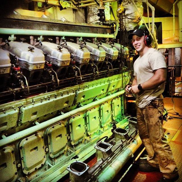 Midshipman Yeik Overhauling a Diesel Generator