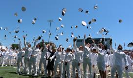 2016 graduates hat toss