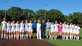 Women's Soccer Team with RDML Dunlap, Deputy Superintendent performing the duties of the Superintendent,  Coach Mendes, Capt. Jim Tobin, '77, and Kris Schnatz, Director of Athletics