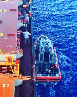 Deck Officers and Crew of M/V National Glory conduction rescue operation at sea