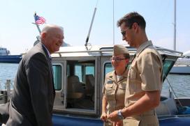 The Administrator thanks Midshipmen Hinkle and Supry 