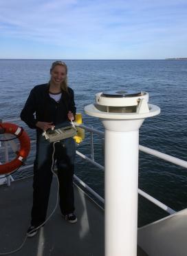 Midshipman 2nd Class Nina Demet operates the vessel's dynamic positioning system from the remote unit