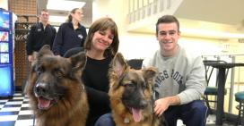 Kristen Papile, Director of Therapy Dog Team and Daniel Curry with Puppy Trainee, Krieger and his  Dad, Breeze