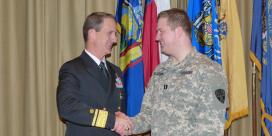 RADM Helis extends his best wishes to CPT Taliaferro 